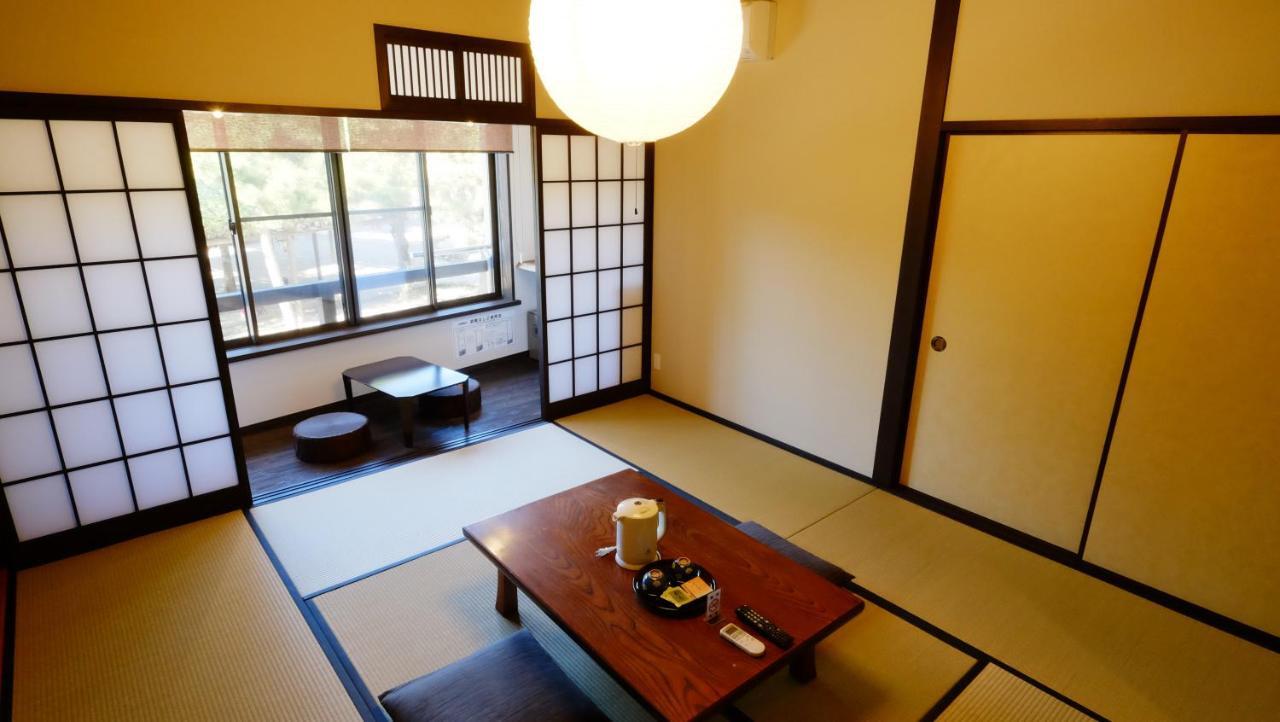 Oyado Tsukiusagi Hatsukaichi Rum bild