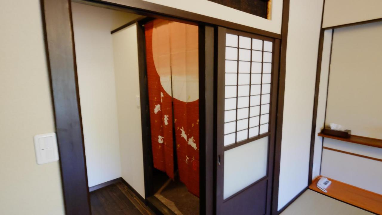Oyado Tsukiusagi Hatsukaichi Rum bild